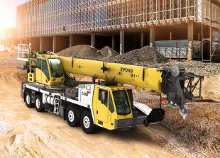 New-Grove-TMS800 2-boosts-productivity-with-easier-roading-and-big-crane-features.jpg